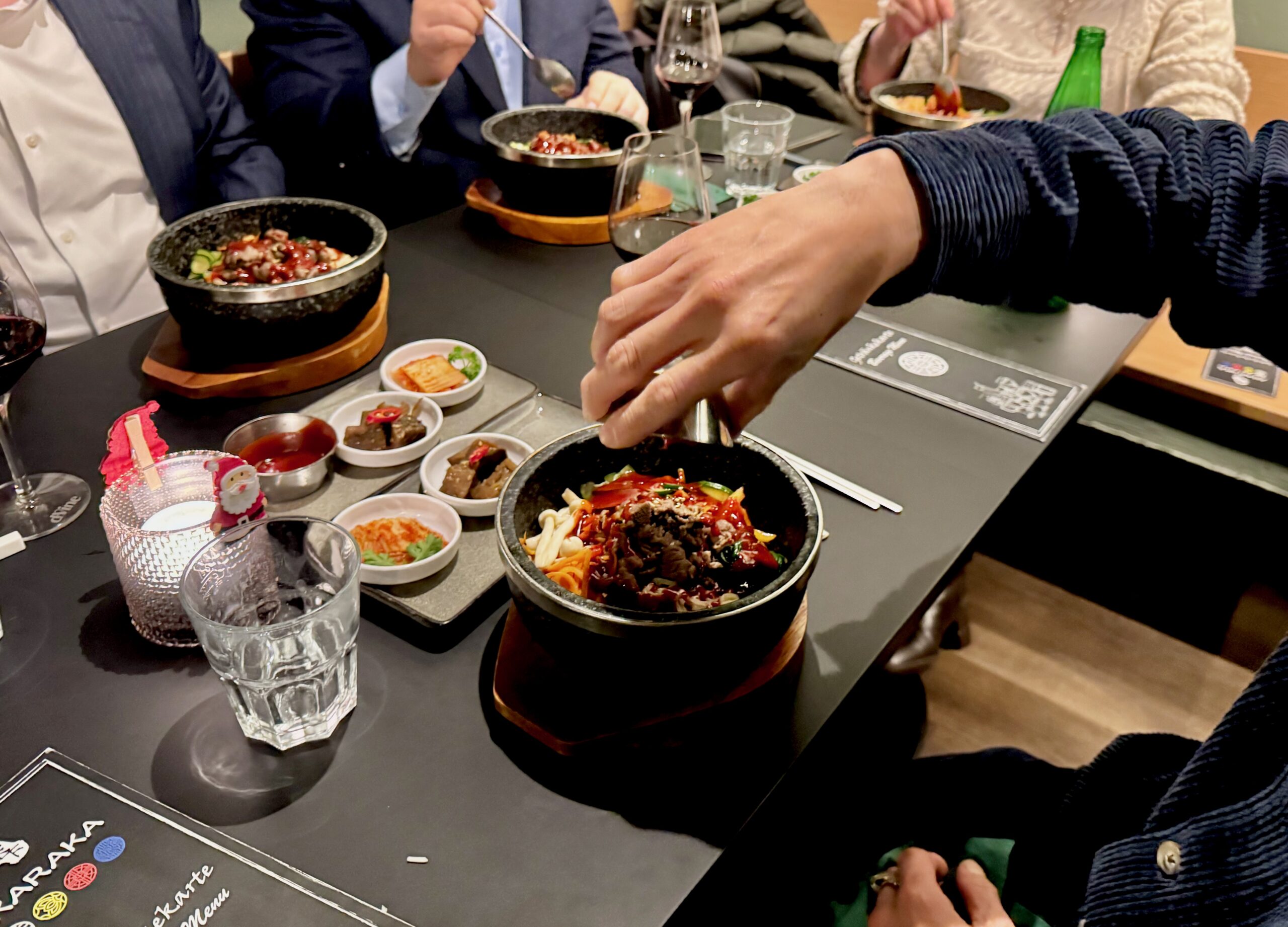 Mama Lim Dinner table with bibimbap & banchan